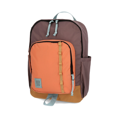 Multicolored backpack with coral front panel on a white background